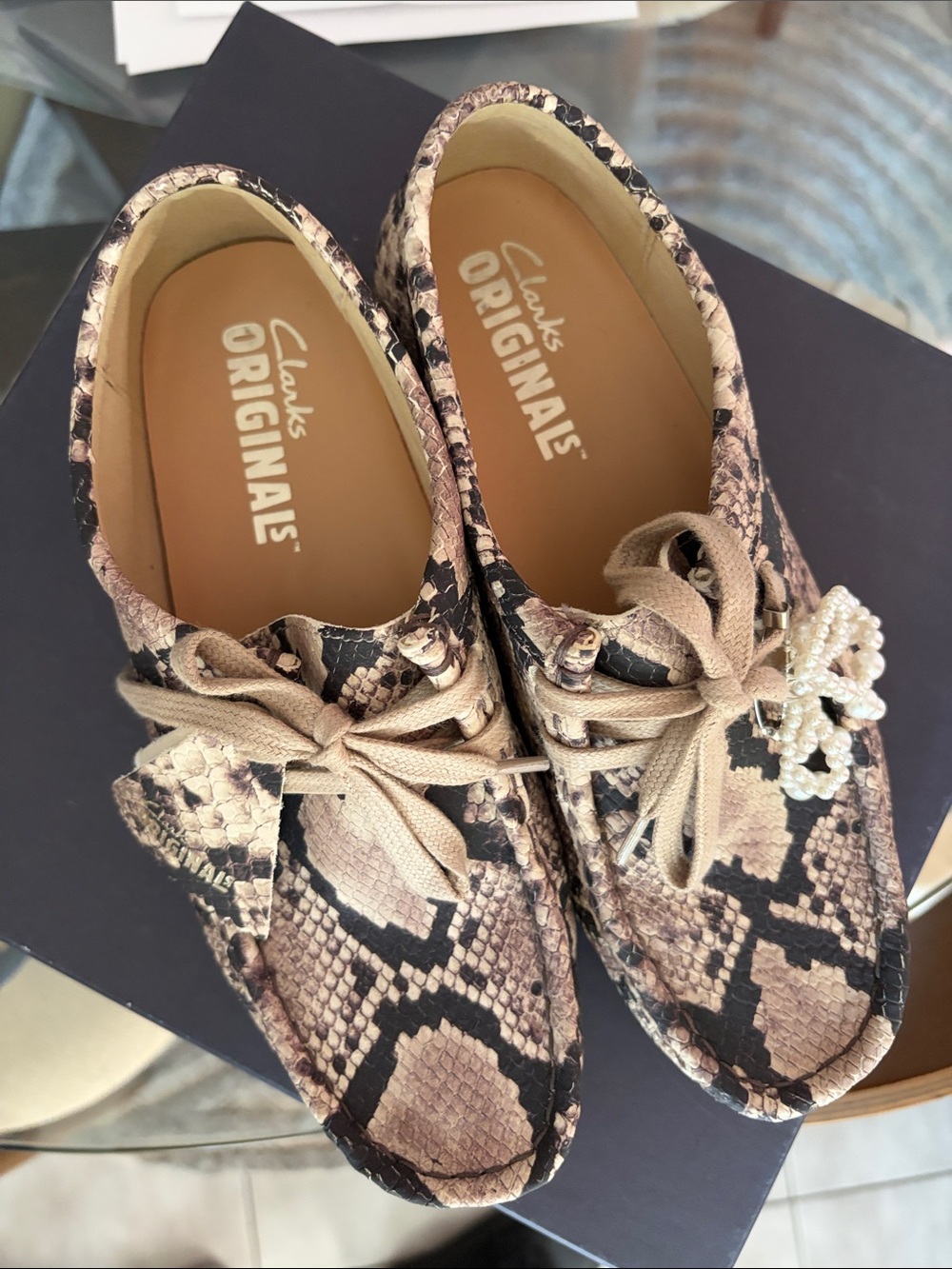 Clarks Snake-Print Moccasins in Taupe and Black